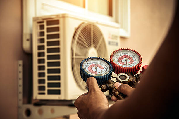 Professional Air Conditioning Service technician working in Cokeburg, PA